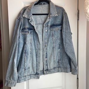 Over sized denim jacket with design on back